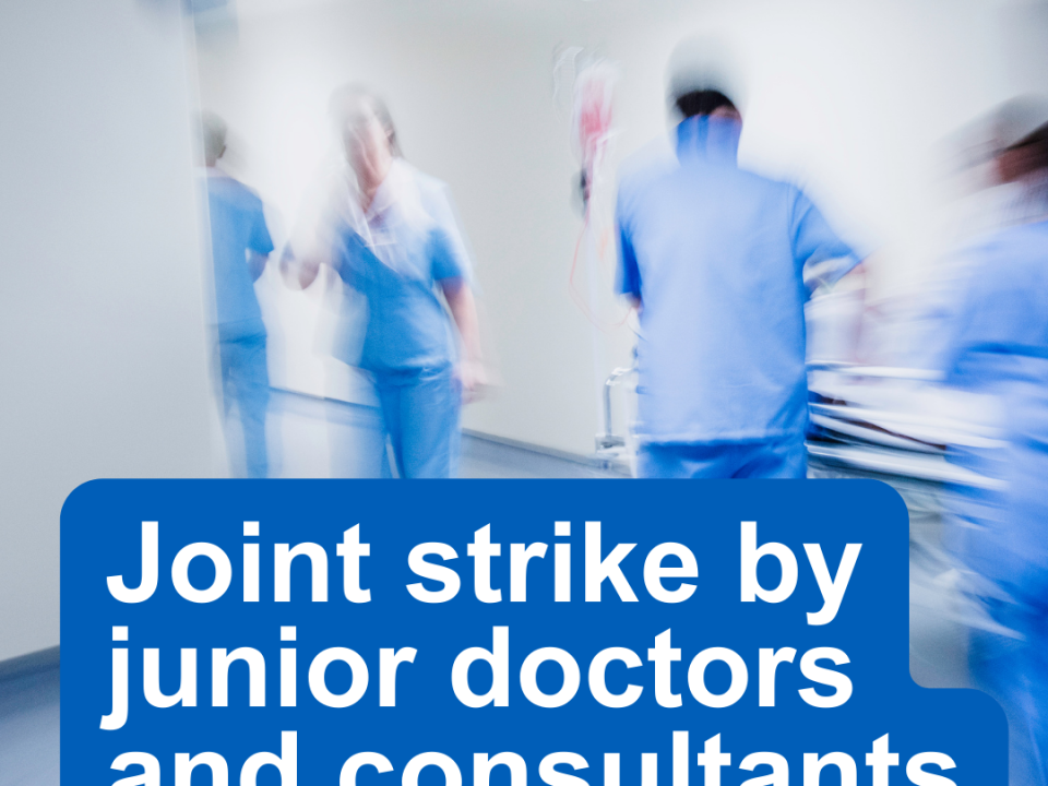 A picture if staff at hospital with text over the top which says "joint strike by junior doctors and consultants"