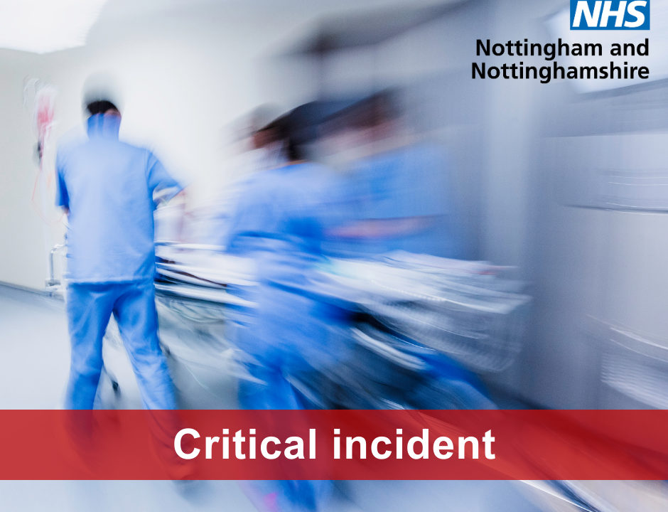 A blurred picture of a ward with the text saying "critical incident" on a red banner